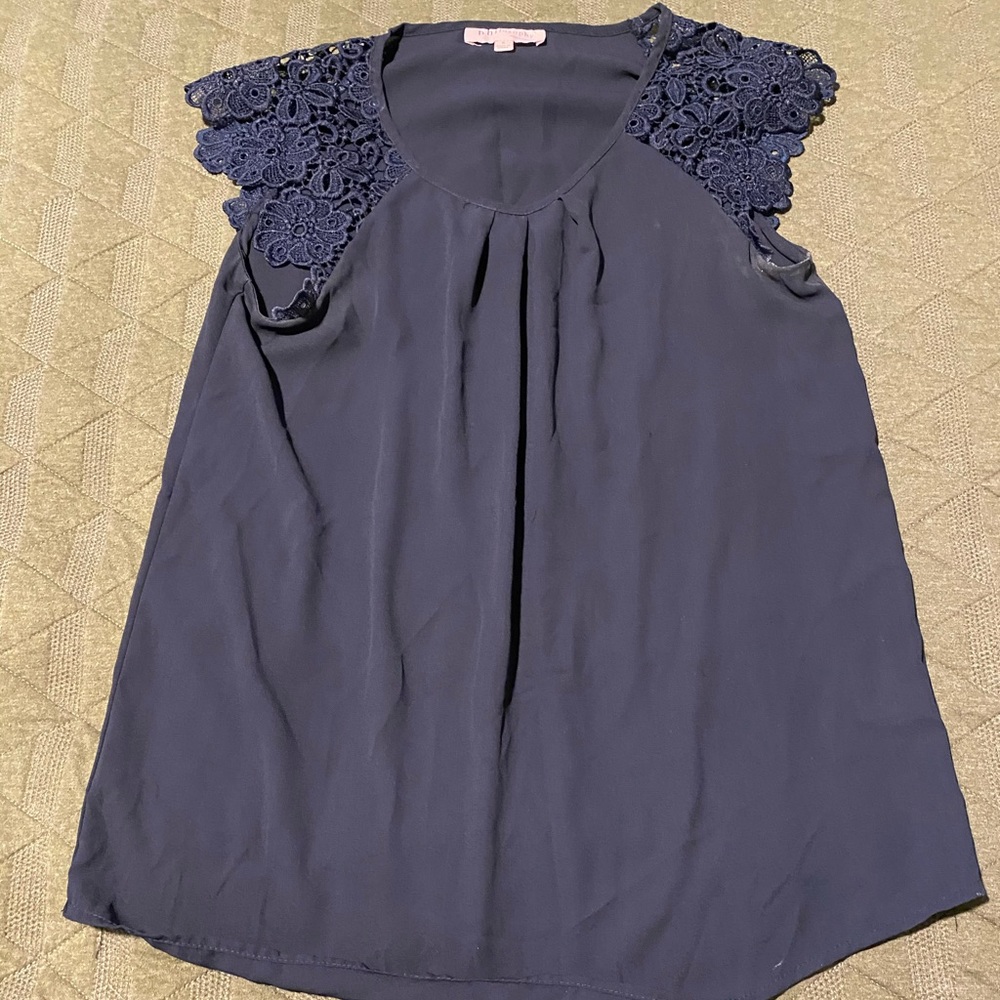 Navy top with detailed sleeves